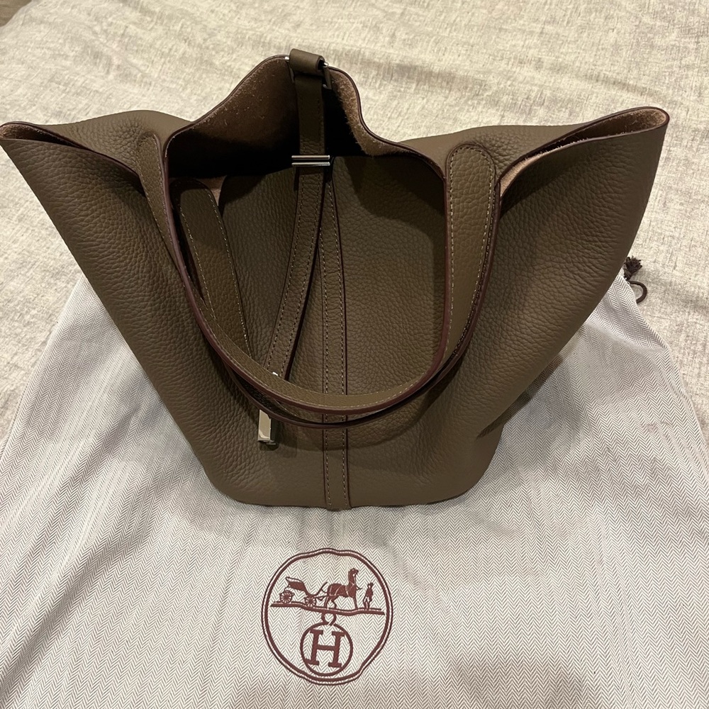 New beautiful taupe leather bag.